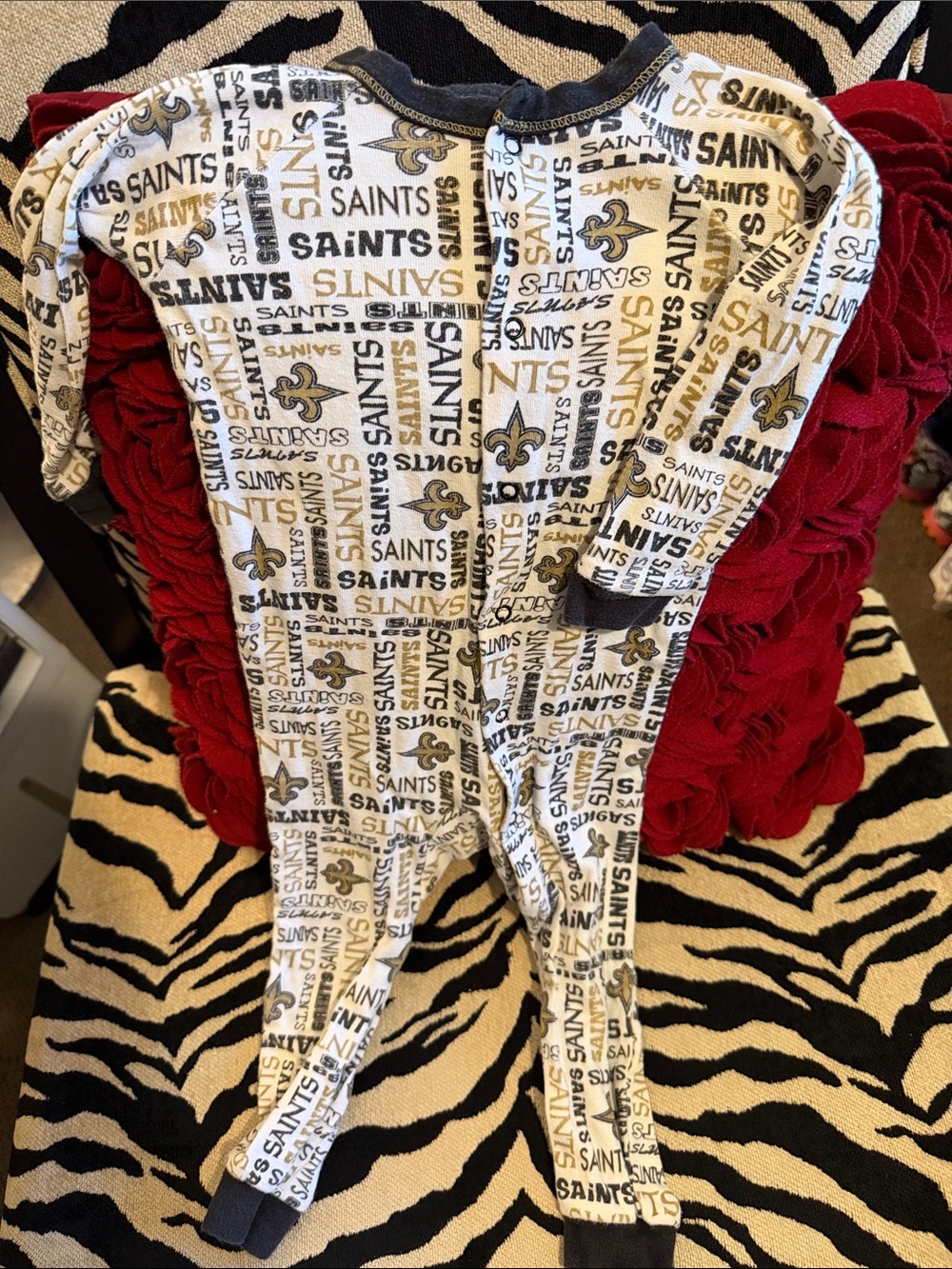 NFL New Orleans Saints Infant Footed One-Piece Pajama White, Gold, Black